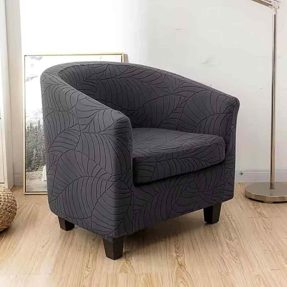 Housse Fauteuil Crapaud Extensible grise foncé dans un salon