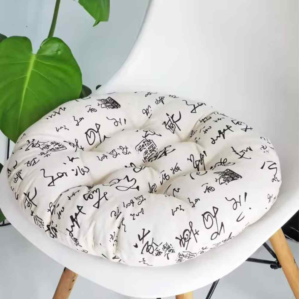 Coussin de Chaise Rond Écriture blanc en maison sur un siège