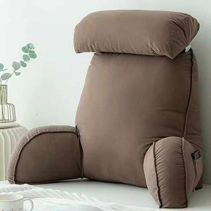 Coussin de Lecture Ergonomique Marron sur un lit