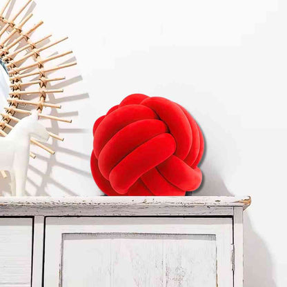 La décoration avec le Coussin Noeud​ Rouge 