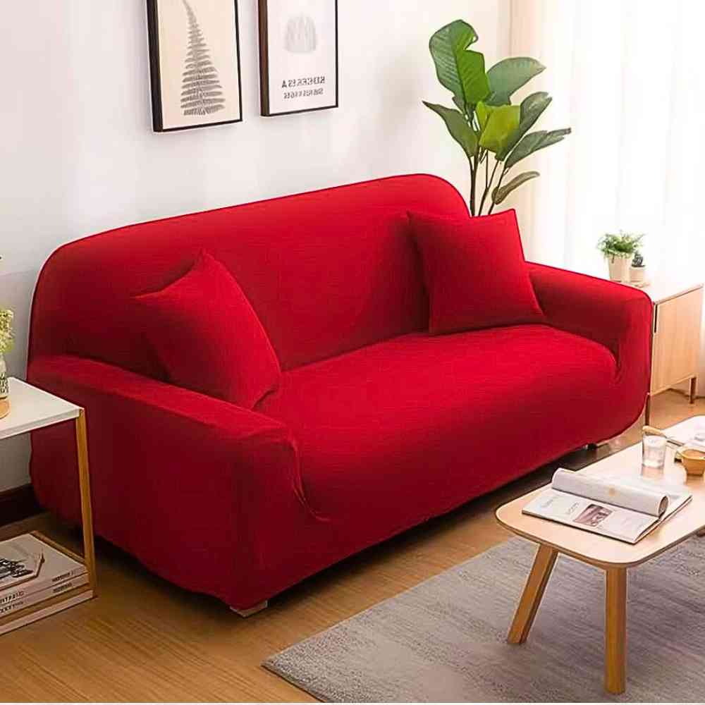 La protection de Housse Canapé 3 Places rouge sur un canapé