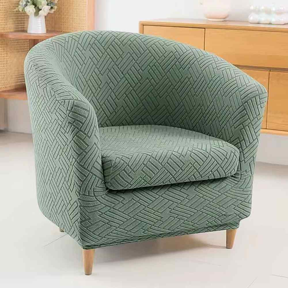 Un salon avec la Housse Fauteuil Cabriolet Extensible verte