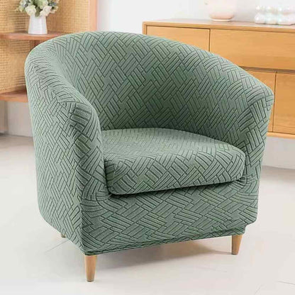 Un salon avec la Housse Fauteuil Cabriolet Extensible verte